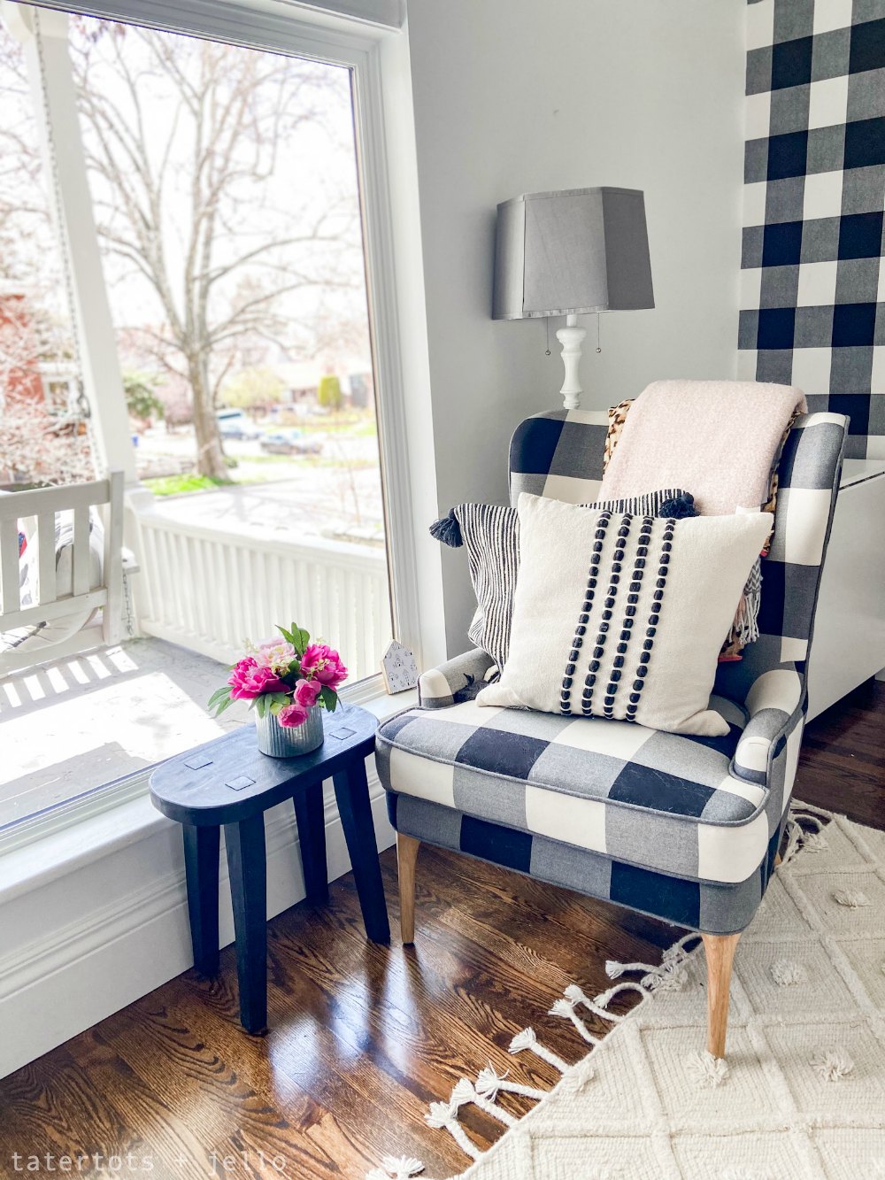 black and white craft room office with reading nook.