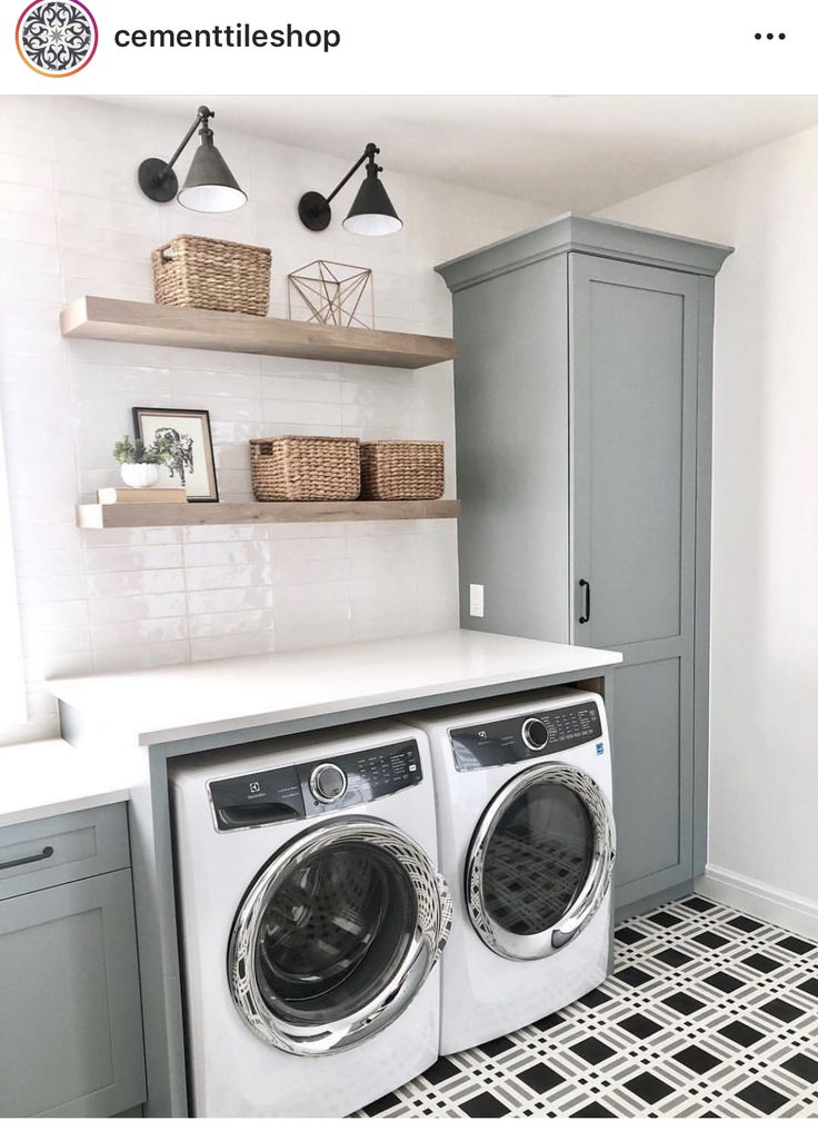 Black and white geometric shaped tile farmhouse laundry room.