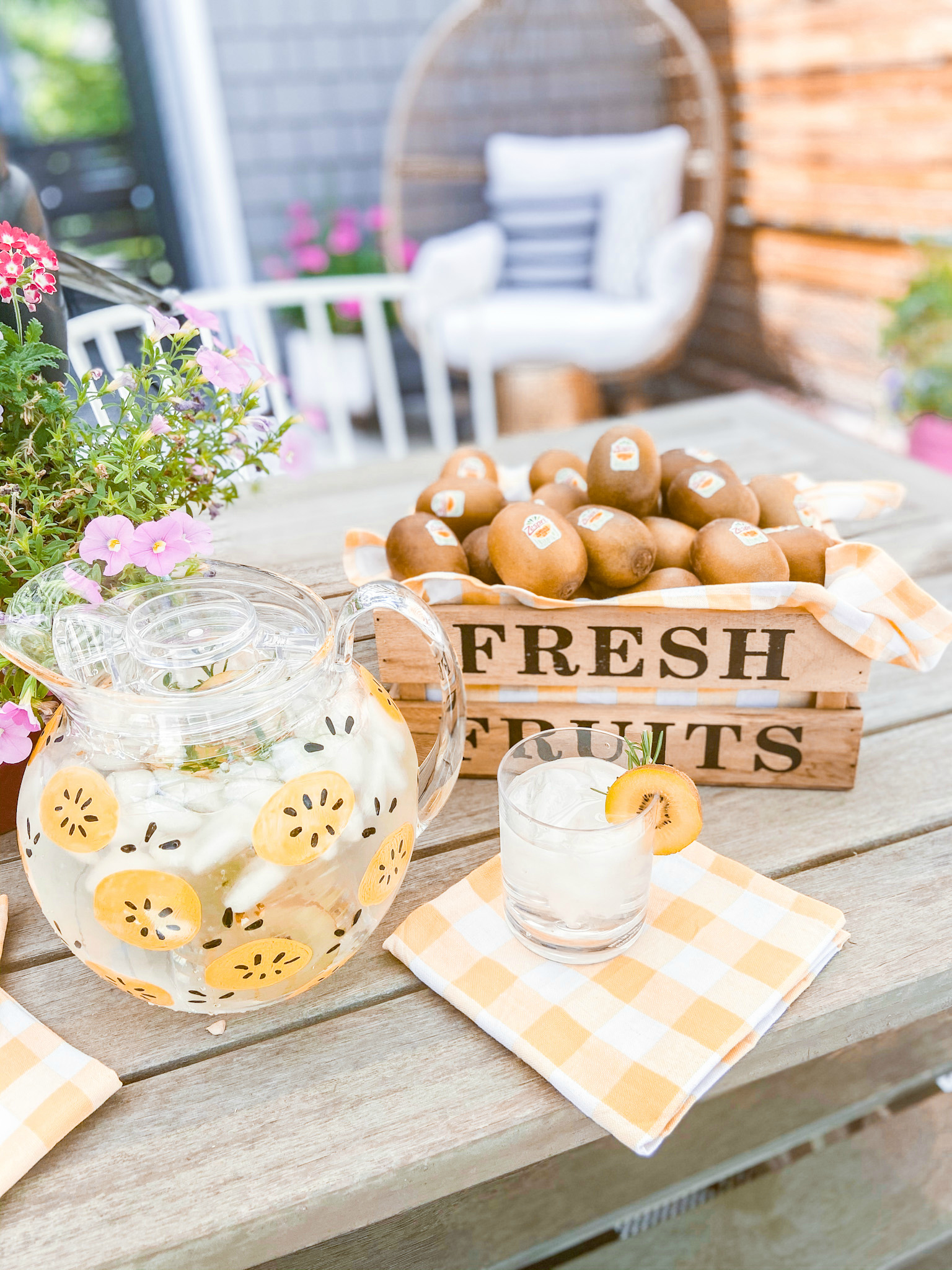 DIY Summertime Painted SunGold Kiwi Pitcher. Celebrate Summer by making a painted pitcher featuring the bright and delicious Zespri™ SunGold™ Kiwifruit.