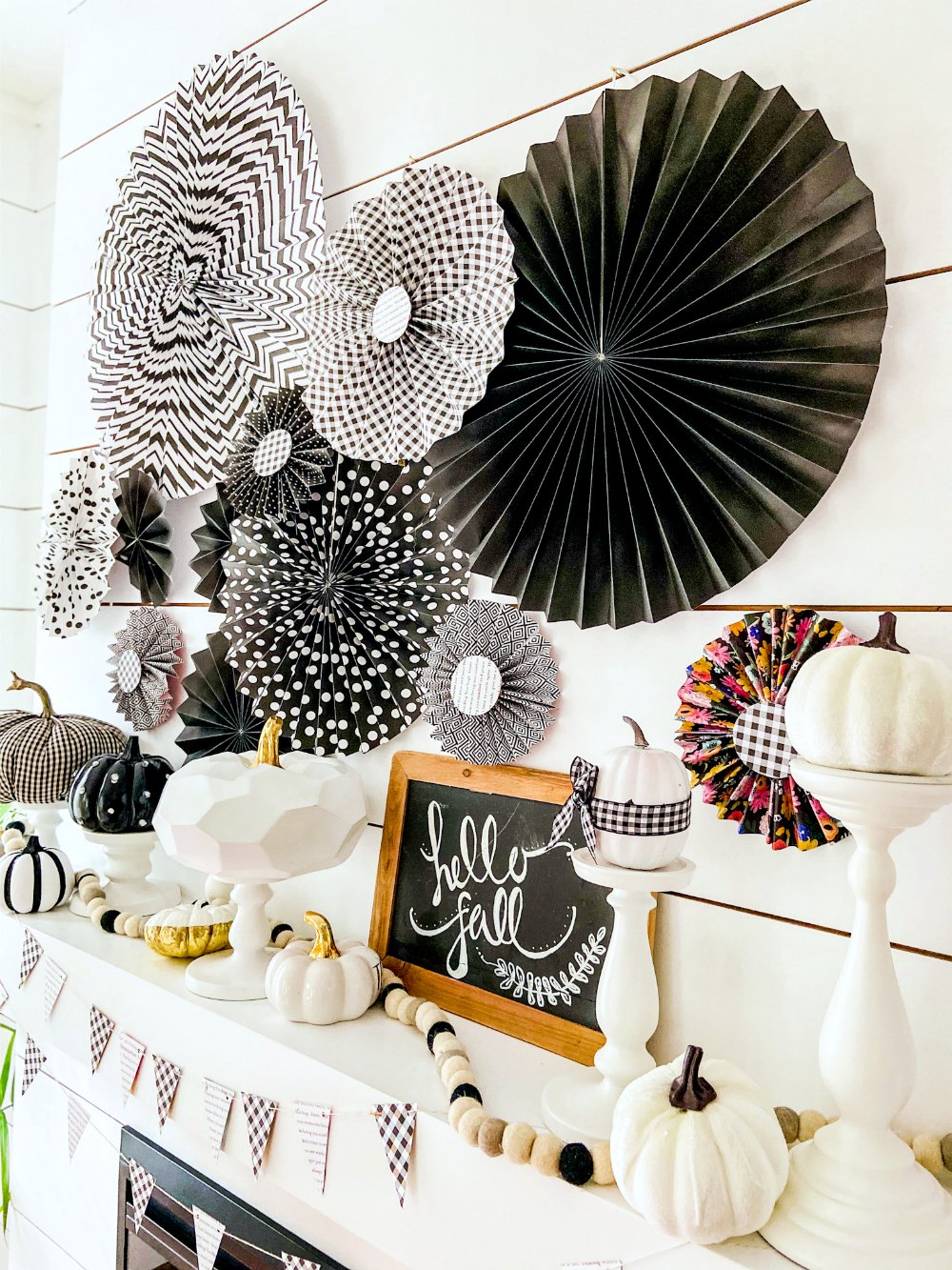 Easy Black and White Fall Mantel! Create a striking black and white mantel with pumpkins, DIY paper medallions and paper banner! 