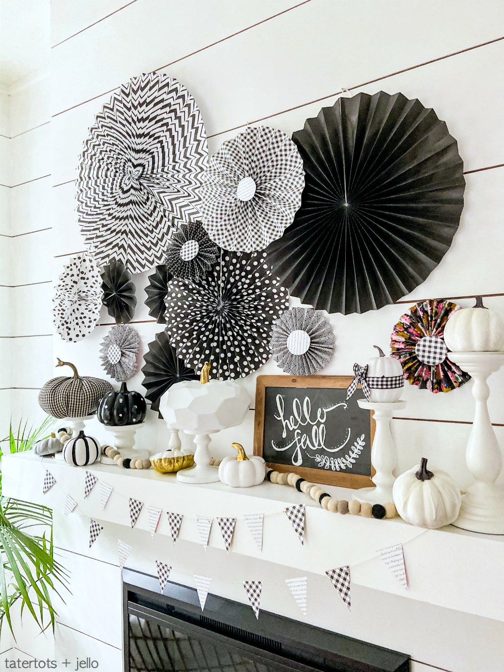 Easy Black and White Fall Mantel! Create a striking black and white mantel with pumpkins, DIY paper medallions and paper banner! 