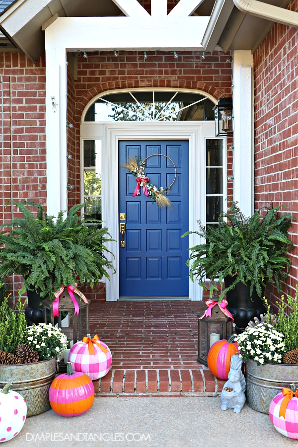 Dimples and Tangles fall porch with plaid DIY pumpkins