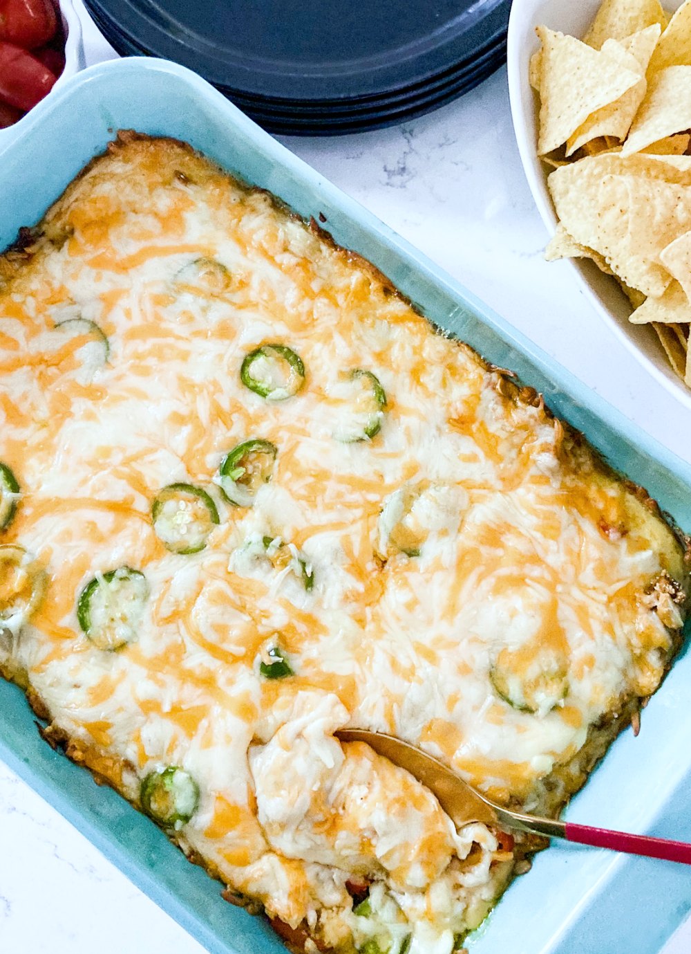 Low Carb Cheesy Taco Bake - Keto. A cheesy keto taco casserole that is the perfect topping over salads for you and over chips for your kids! All of the taste of tacos with a fractions of the carbs! 
