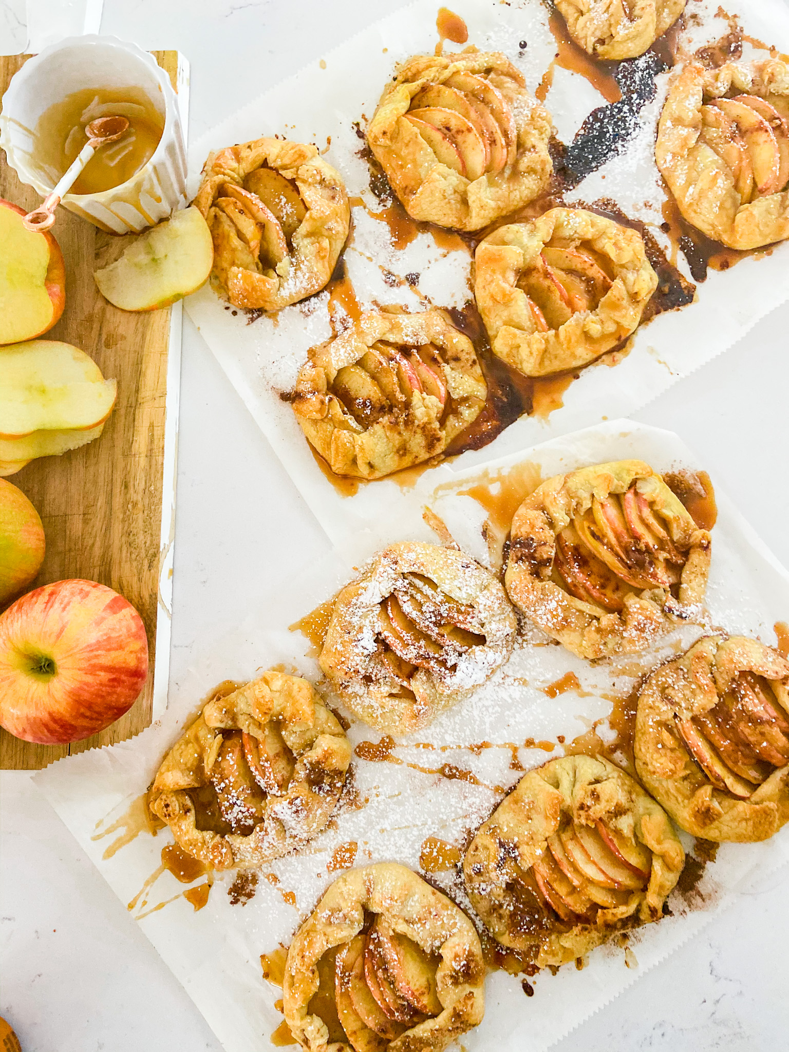 Rustic Mini Apple Galettes. It's apple season! Celebrate by making these easy rustic apple hand pies. They are perfect for fall picnics and family desserts! 