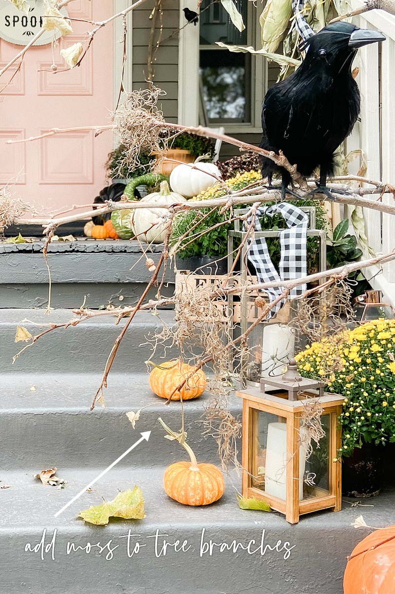 Halloween DIY Spooky Forest Porch. Add some branches, crows and moss to create an easy "spooky" forest for Halloween! 