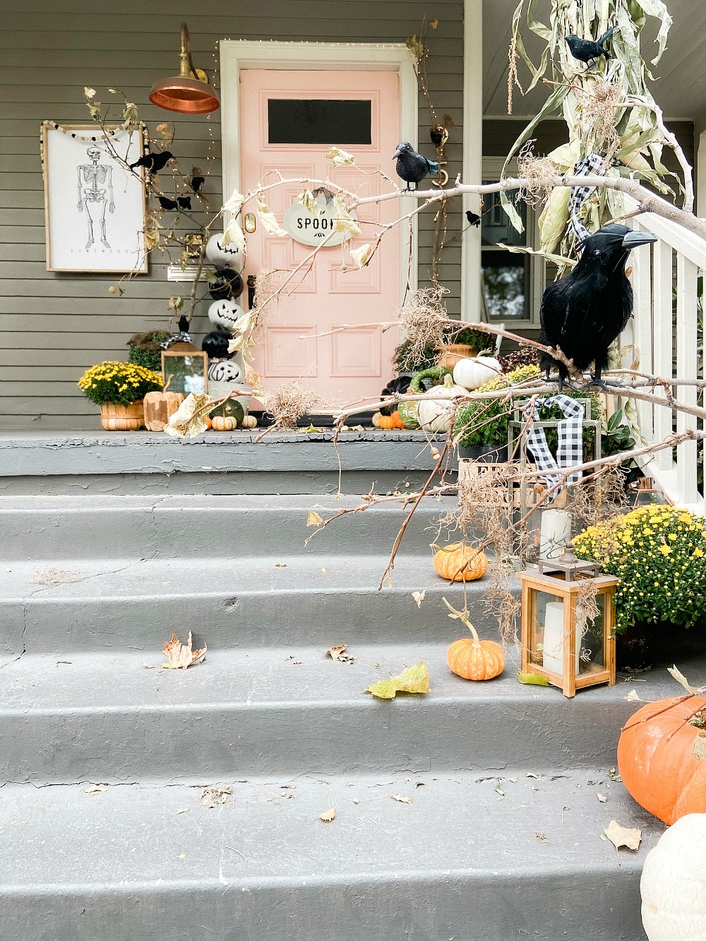 Halloween DIY Spooky Forest Porch. Add some branches, crows and moss to create an easy "spooky" forest for Halloween! 