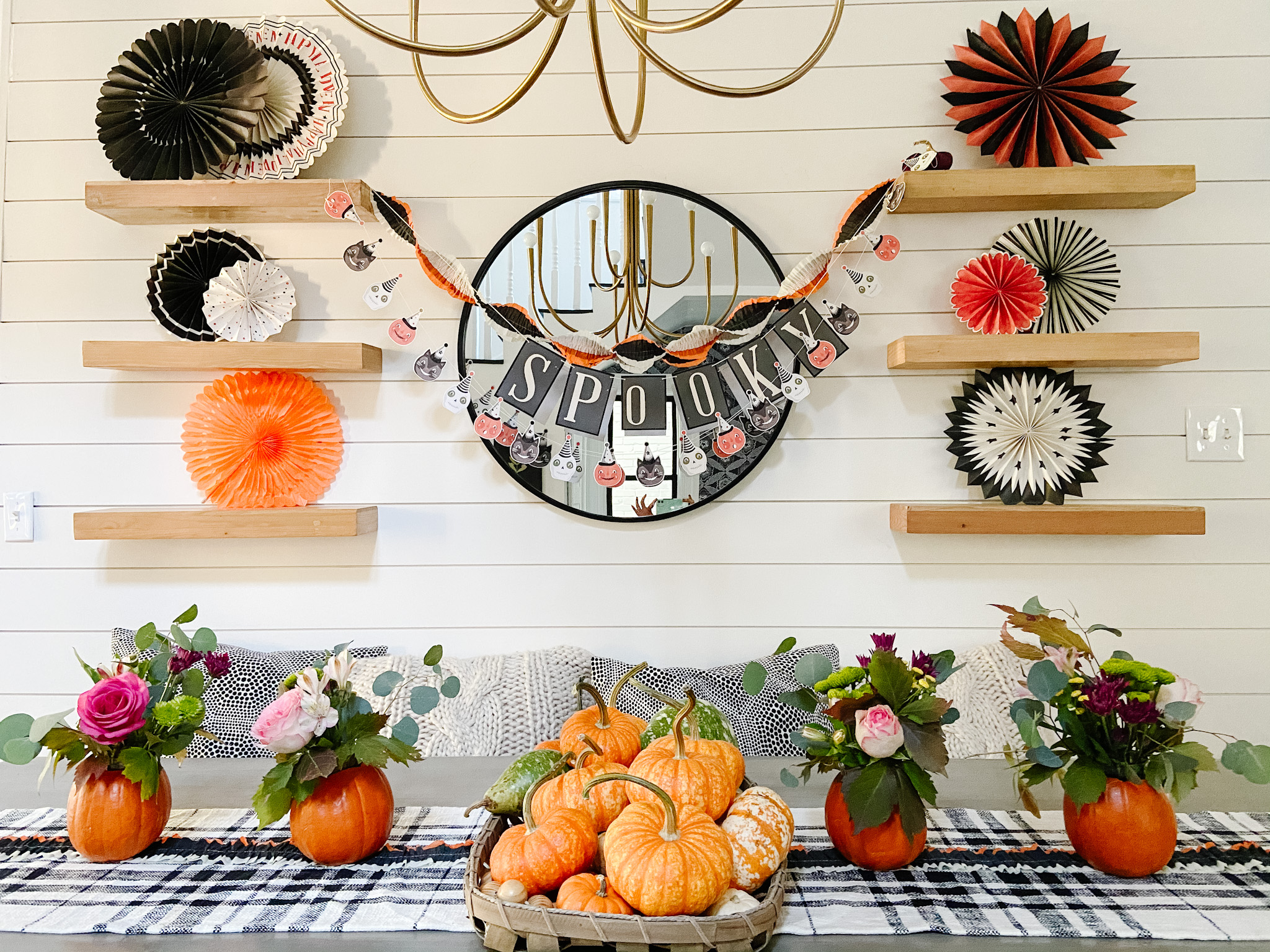 Mini Pumpkin Flower Arrangement Centerpieces. Care small pumpkins and display cut flowers for an festive fall centerpiece.