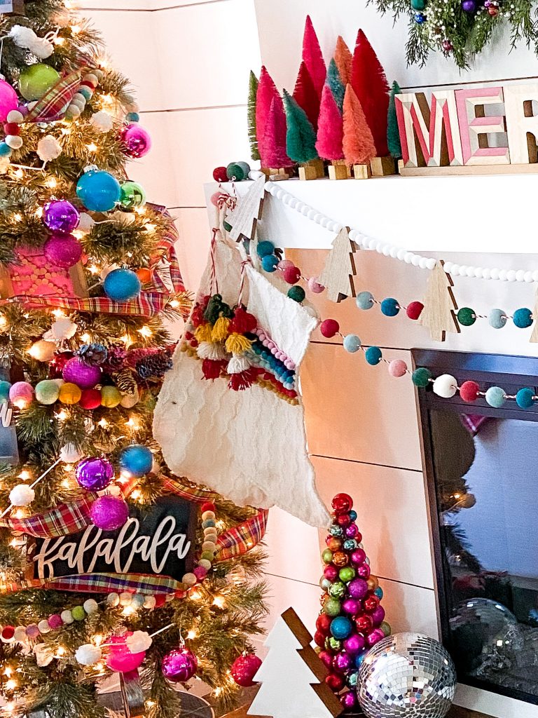 Bright Colorful Merry Mantel. Create colorful holiday cheer with a bright garland, little bottlebrush trees and an embroidery hoop ornament wreath!