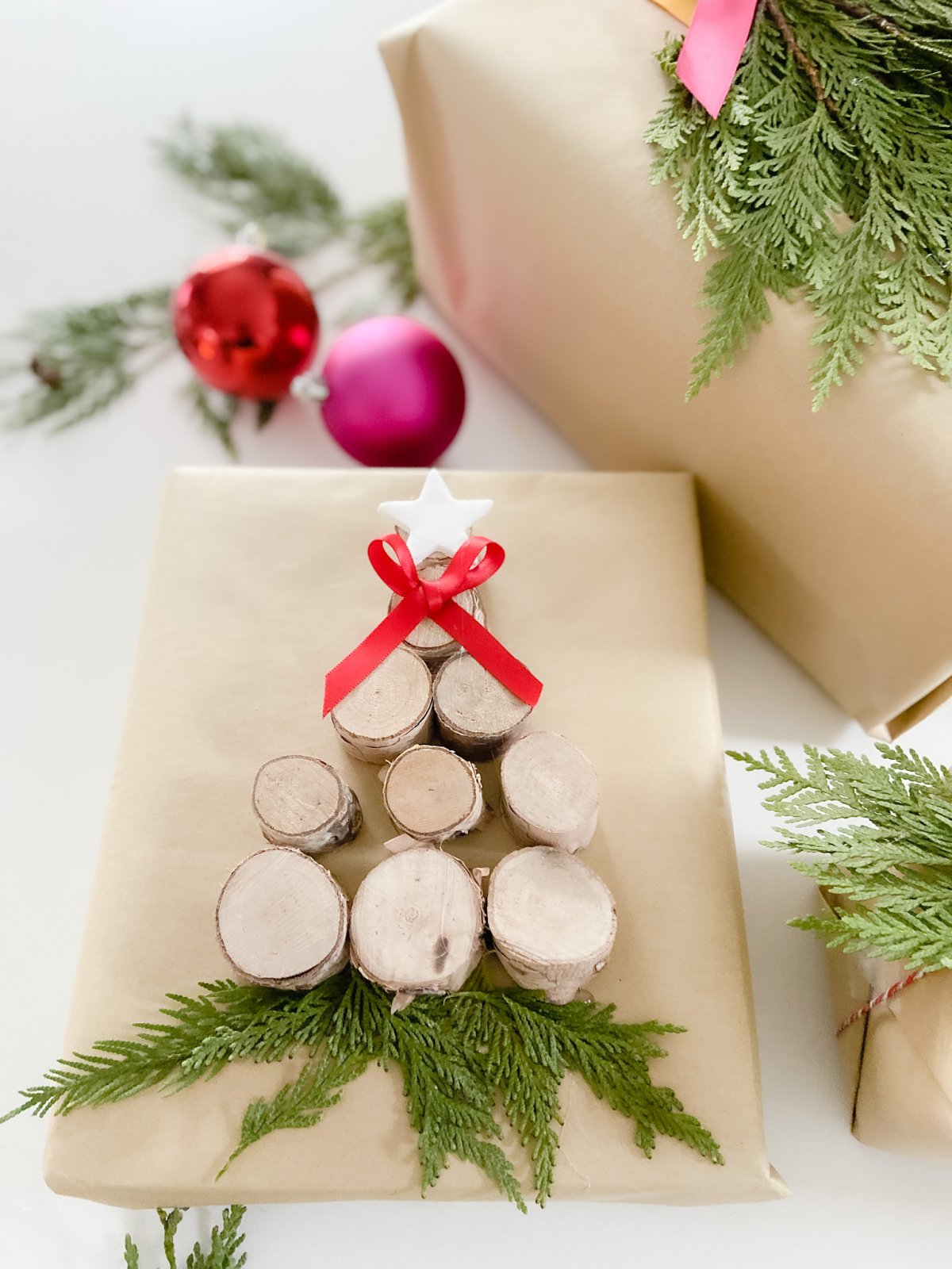 Baking Soda Clay Gift Wrap Embellishment DIY. Using only two pantry ingredients and foraged items from your yard, you can create gorgeous gifts that will look stunning under your tree. 