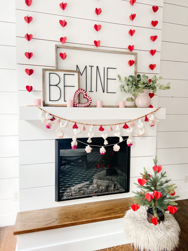 Be Mine Valentine Mantel Ideas. Create some DIY Valentine's signs, hang festive banners two ways and add hearts to a tree for colorful Valentine's Day decor!  