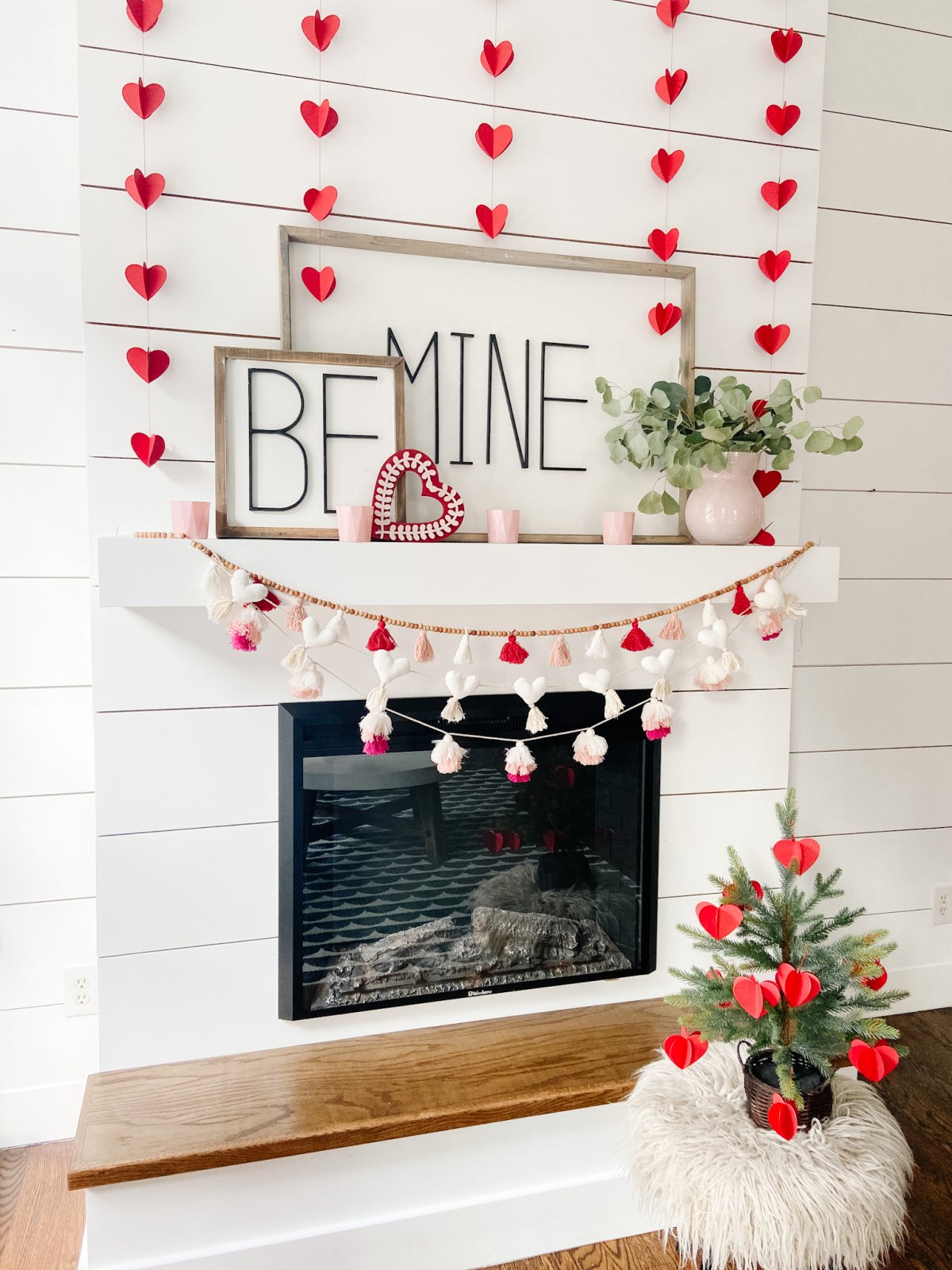 Be Mine Valentine Mantel Ideas. Create some DIY Valentine's signs, hang festive banners two ways and add hearts to a tree for colorful Valentine's Day decor!