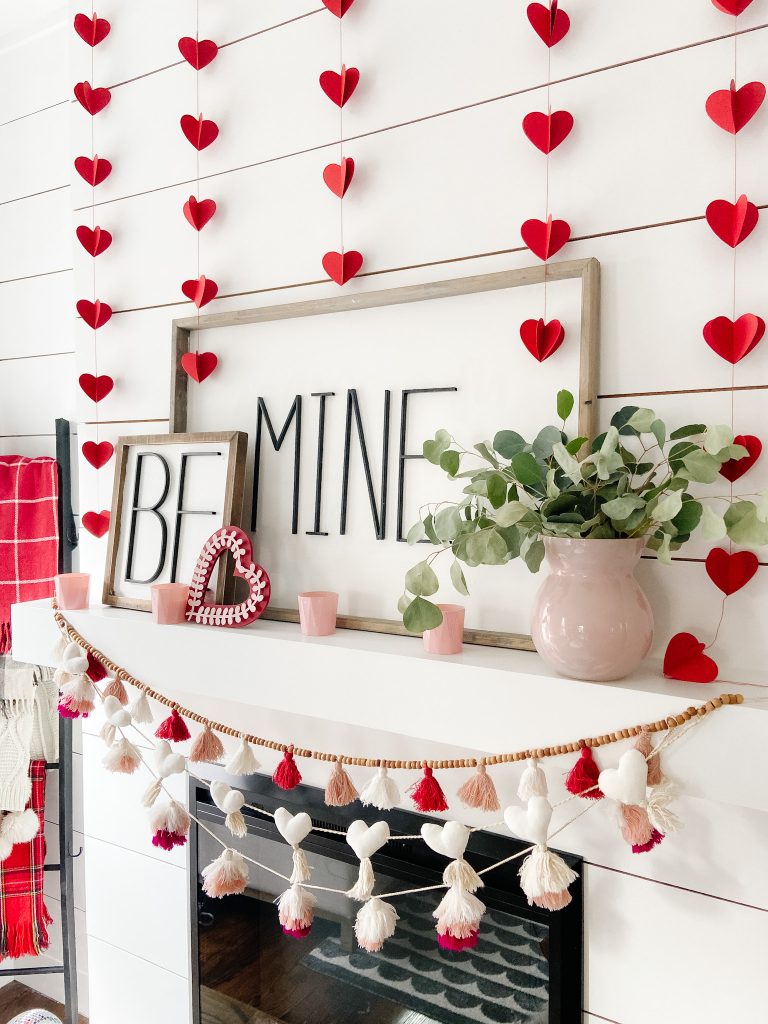 Be Mine Valentine Mantel Ideas. Create some DIY Valentine's signs, hang festive banners two ways and add hearts to a tree for colorful Valentine's Day decor!  