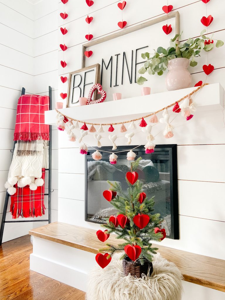 Be Mine Valentine Mantel Ideas. Create some DIY Valentine's signs, hang festive banners two ways and add hearts to a tree for colorful Valentine's Day decor!  