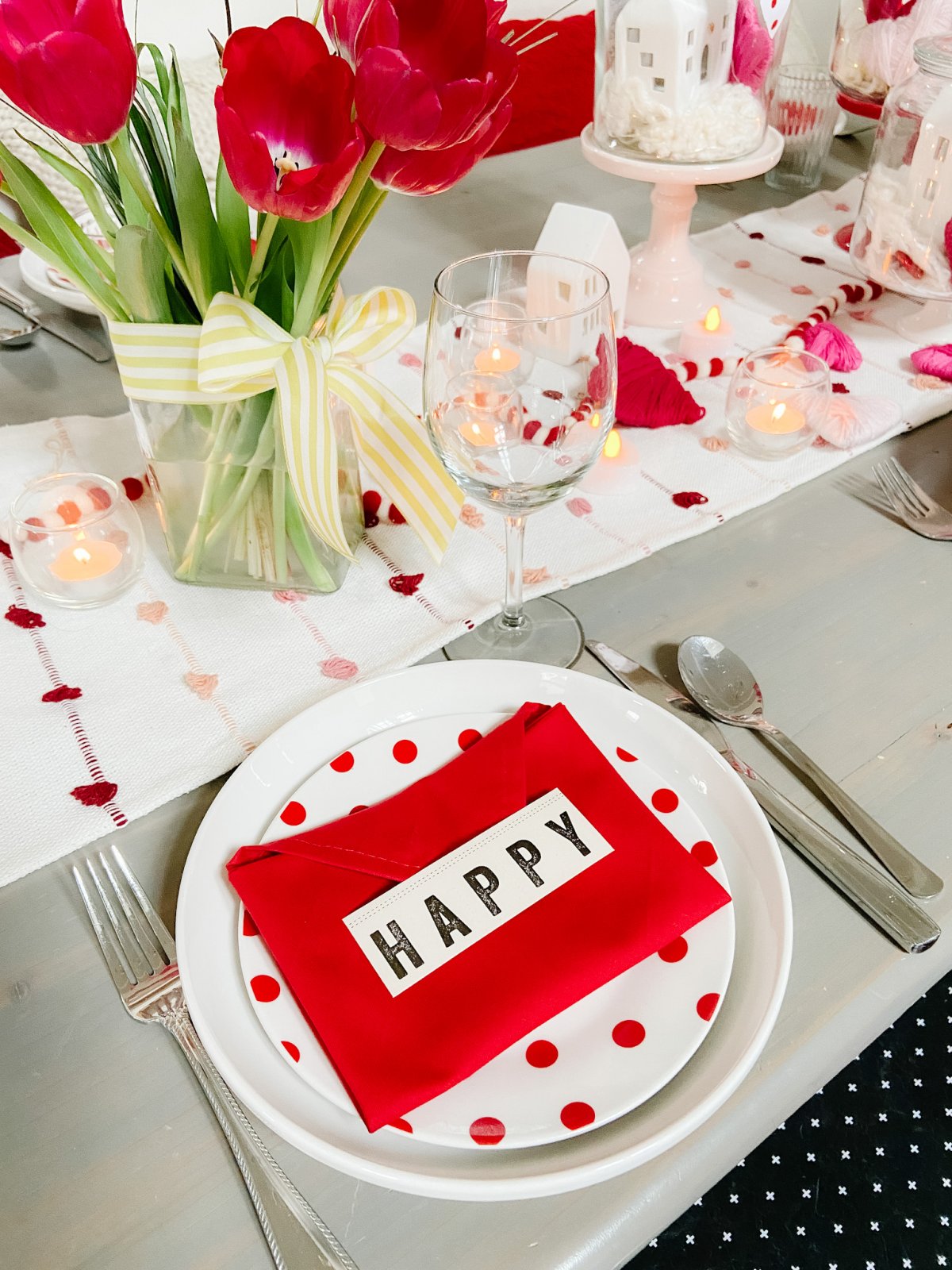 Valentine's Day Table Envelope Napkins. Fold napkins in an envelope shape and add a special hand-written note with free printable cards! 
