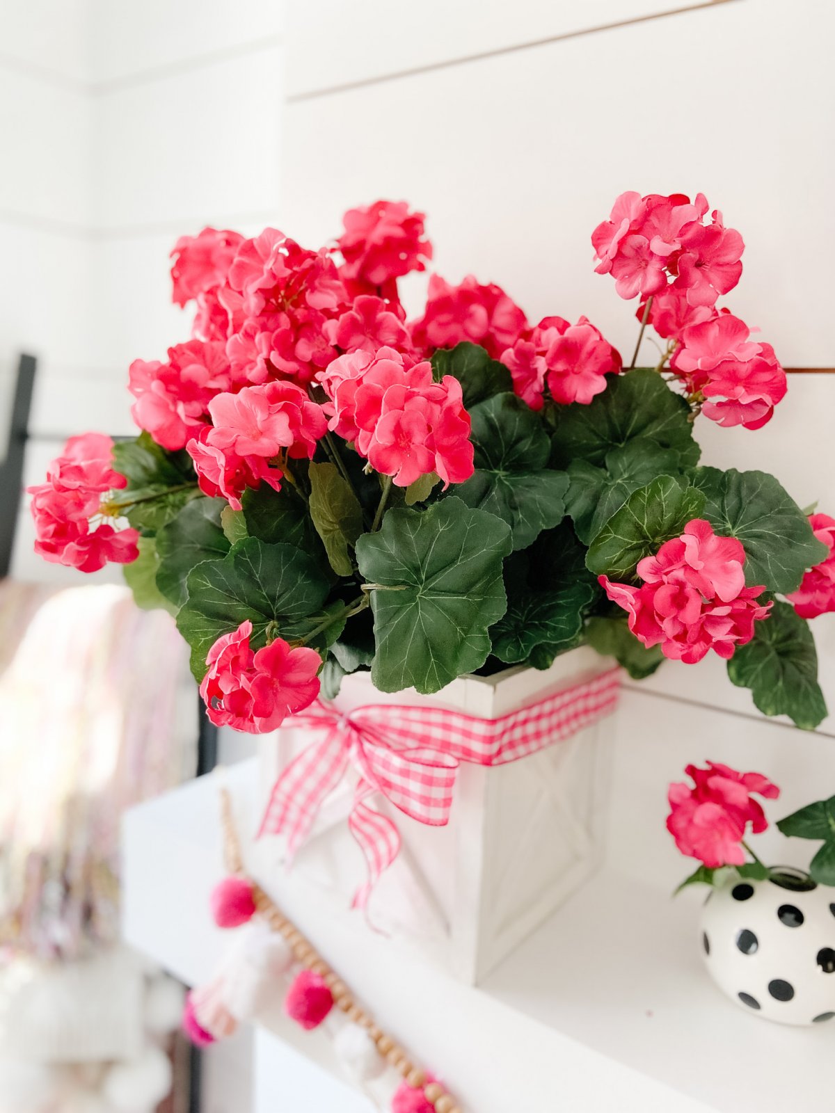 Colorful Spring Mantel with DIY Chalkboard Sign. Add spring color to your home with bright flowers, pretty accents and a DIY chalkboard!