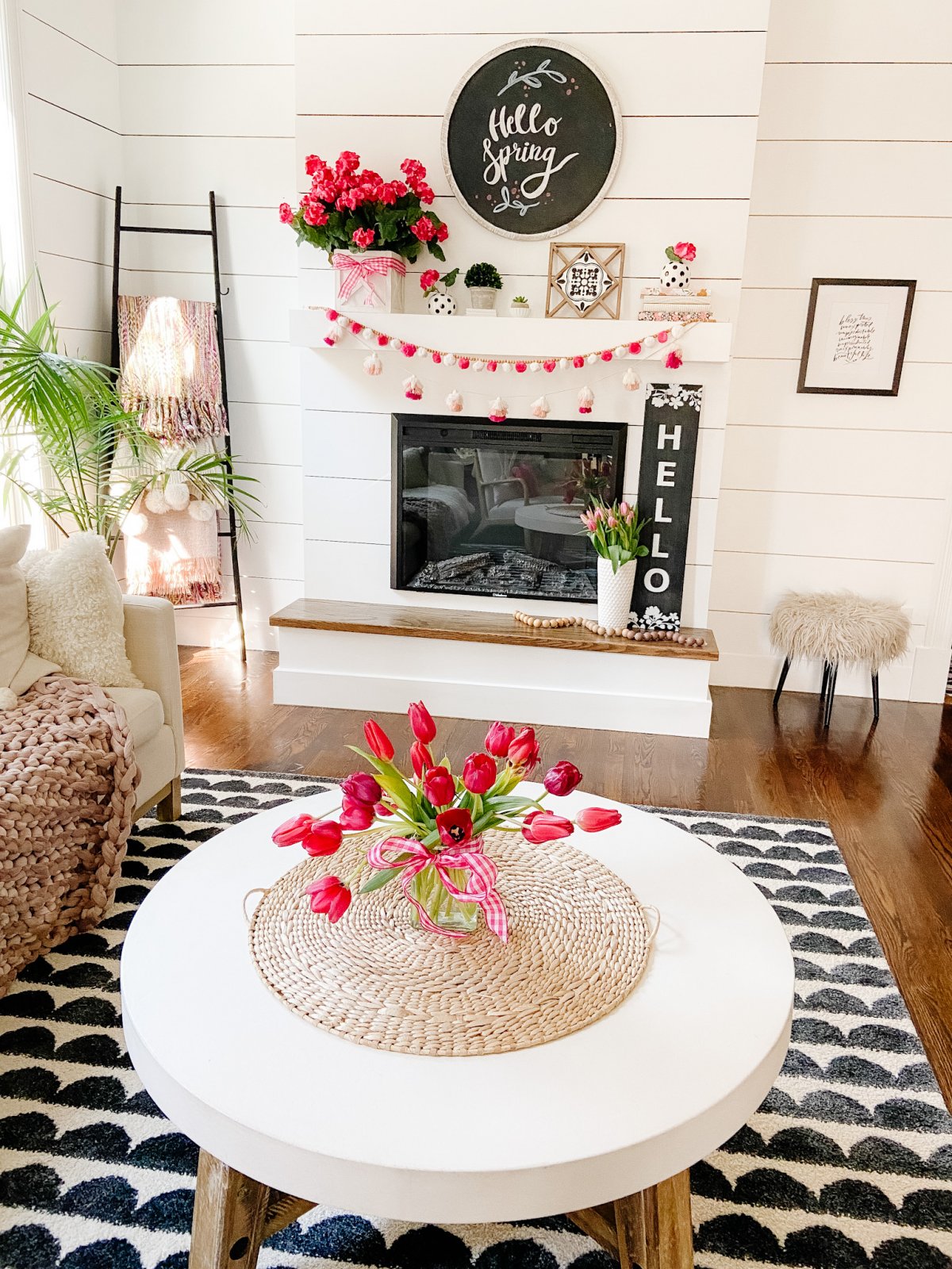 Colorful Spring Mantel with DIY Chalkboard Sign. Add spring color to your home with bright flowers, pretty accents and a DIY chalkboard!