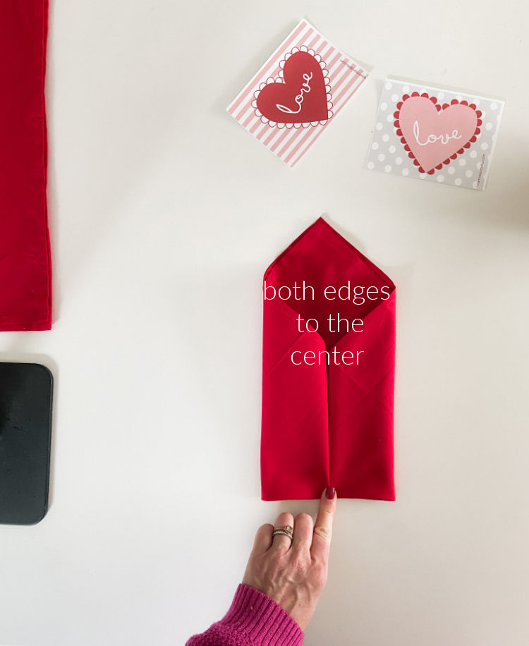 Valentine's Day Table Envelope Napkins. Fold napkins in an envelope shape and add a special hand-written note with free printable cards!