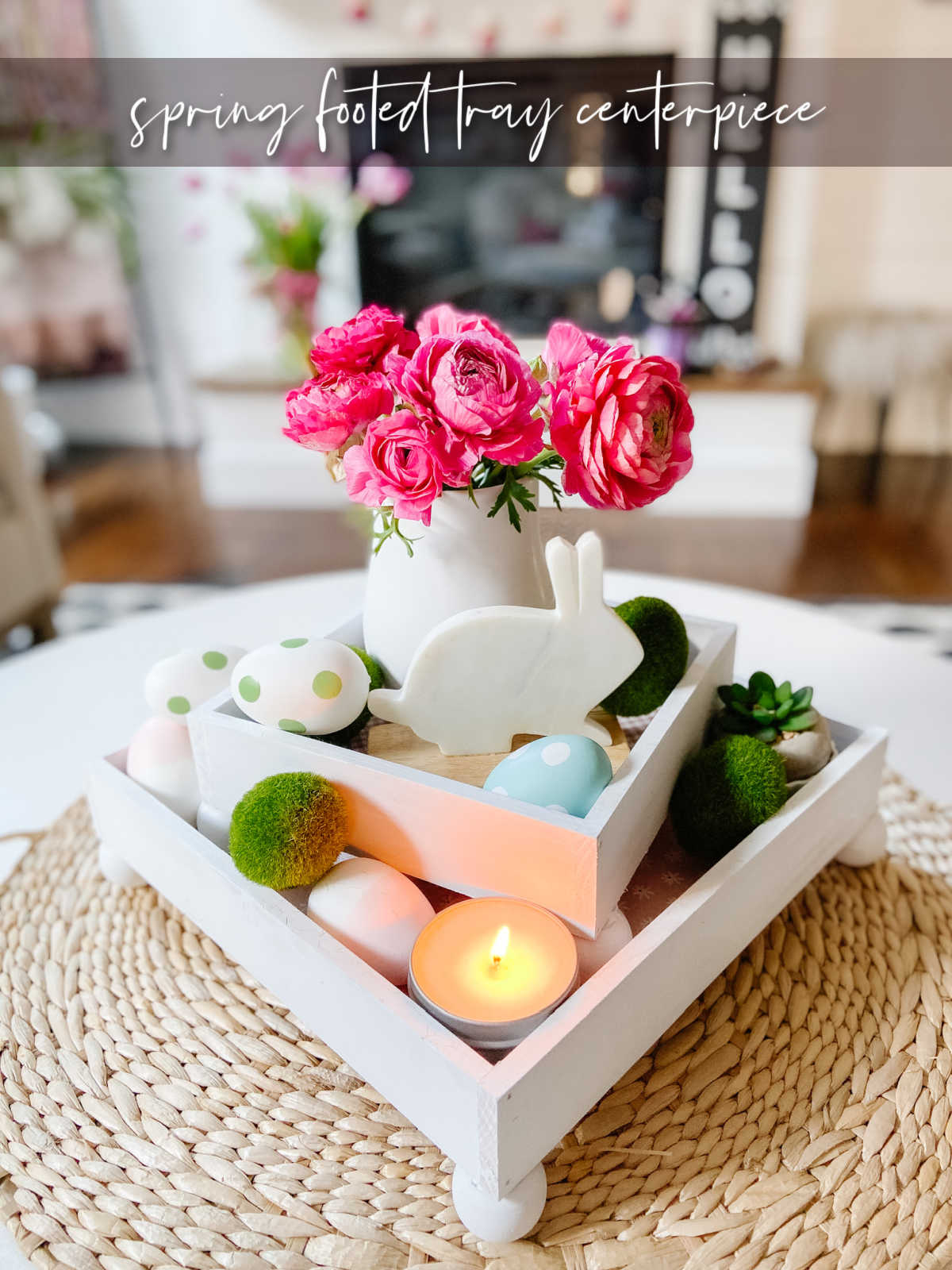 DIY Spring Footed Stacking Tray Centerpiece. Add ball feet to simple wood boxes, add scrapbook paper and layer with fresh flowers and spring items for a pretty centerpiece! 