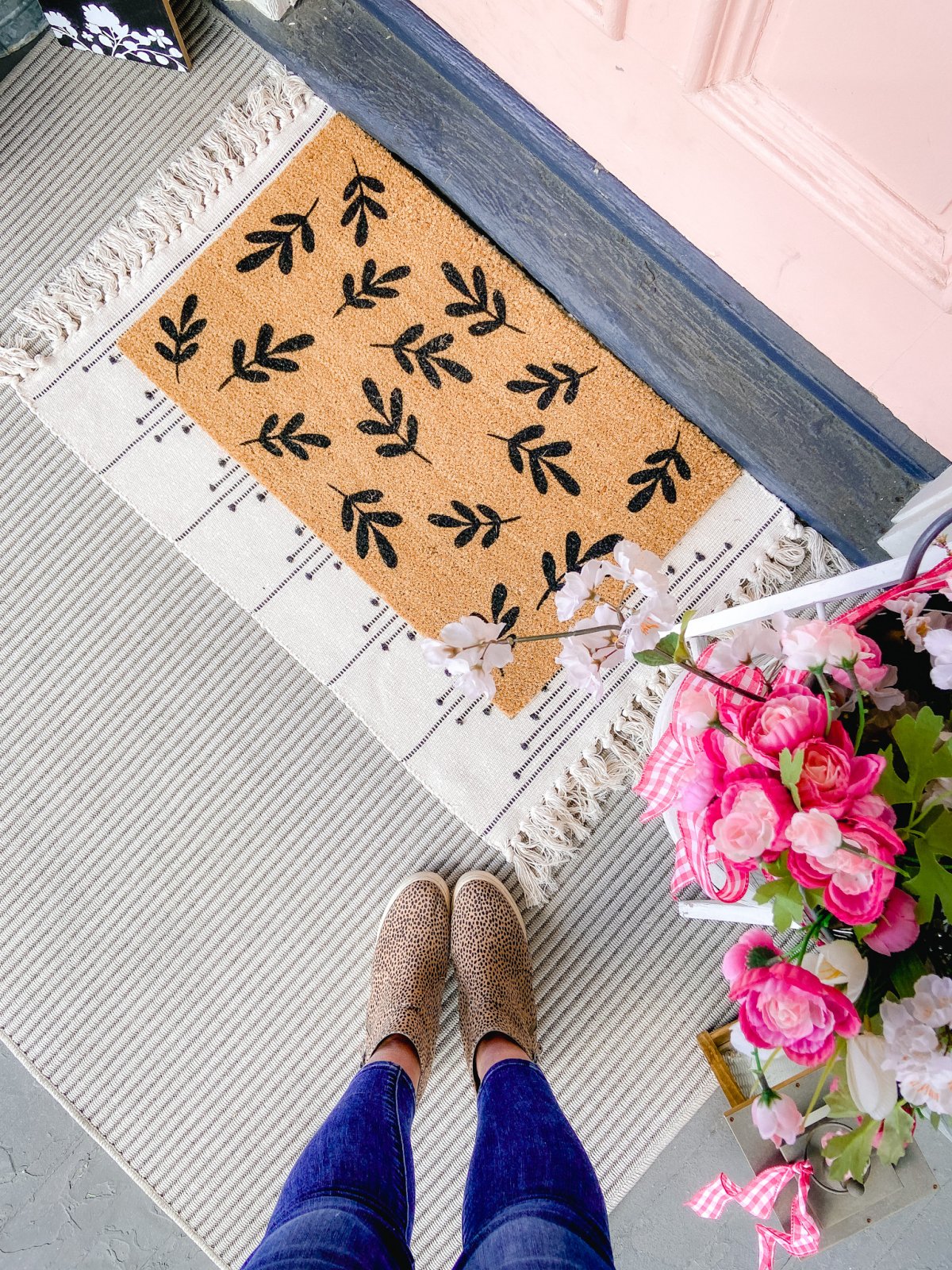 Spring Butterfly Pennant Wreath. Celebrate spring by making this simple wreath with butterflies cut out of cardstock and a big pennant in the middle and a spring saying!