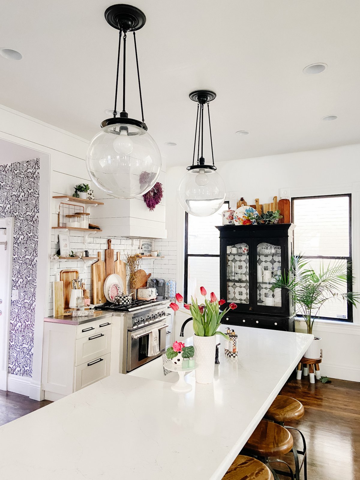 Black Casement Windows Above Kitchen Sink Complement Dark-Colored Island