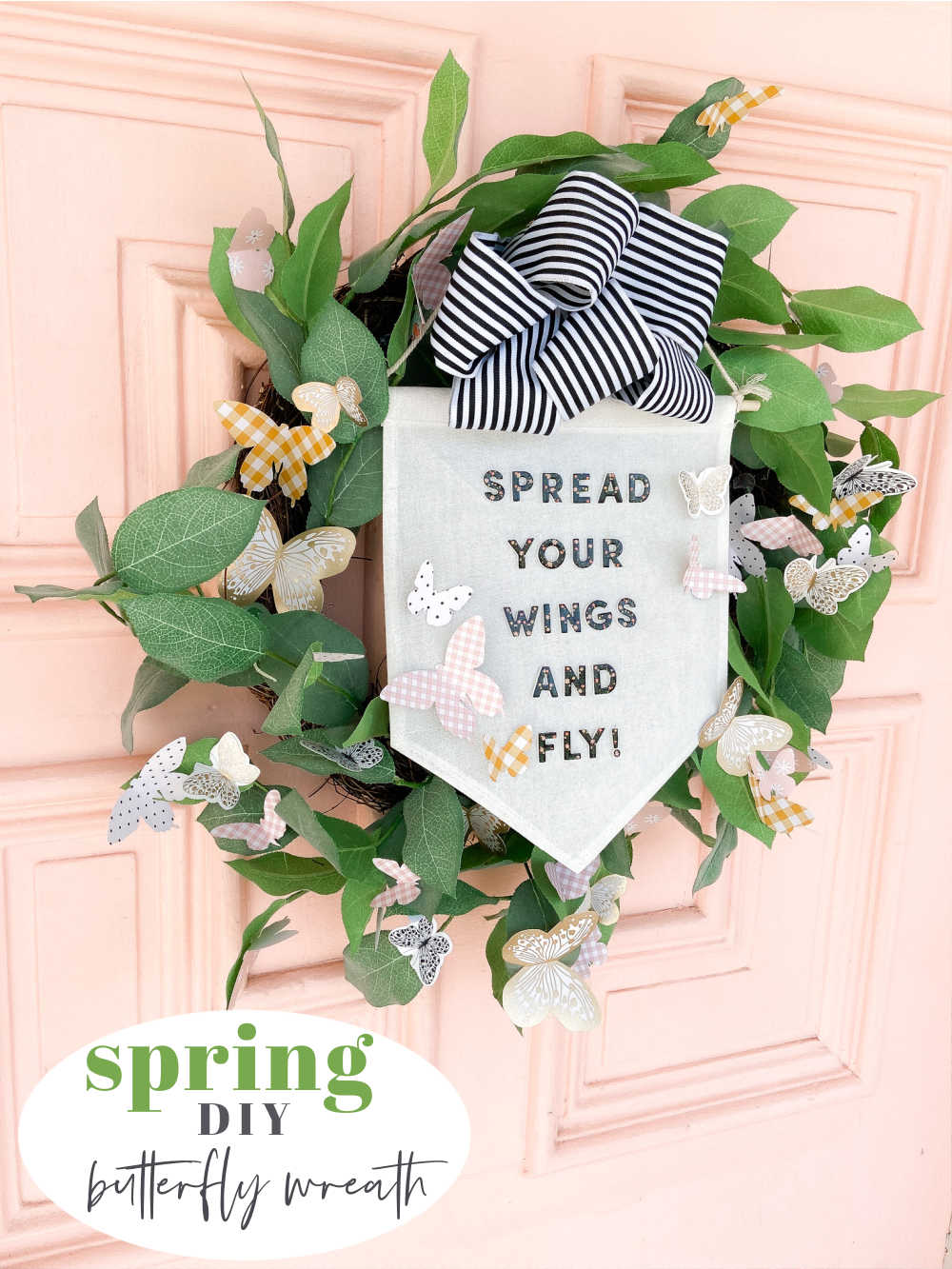 Spring green wreath with butterflies and a pennant in the middle