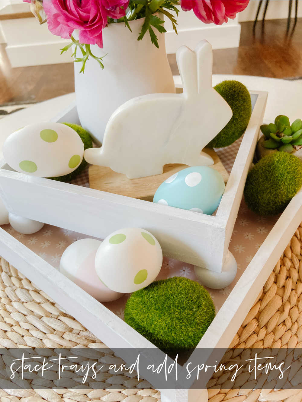 DIY Spring Footed Stacking Tray Centerpiece. Add ball feet to simple wood boxes, add scrapbook paper and layer with fresh flowers and spring items for a pretty centerpiece! 