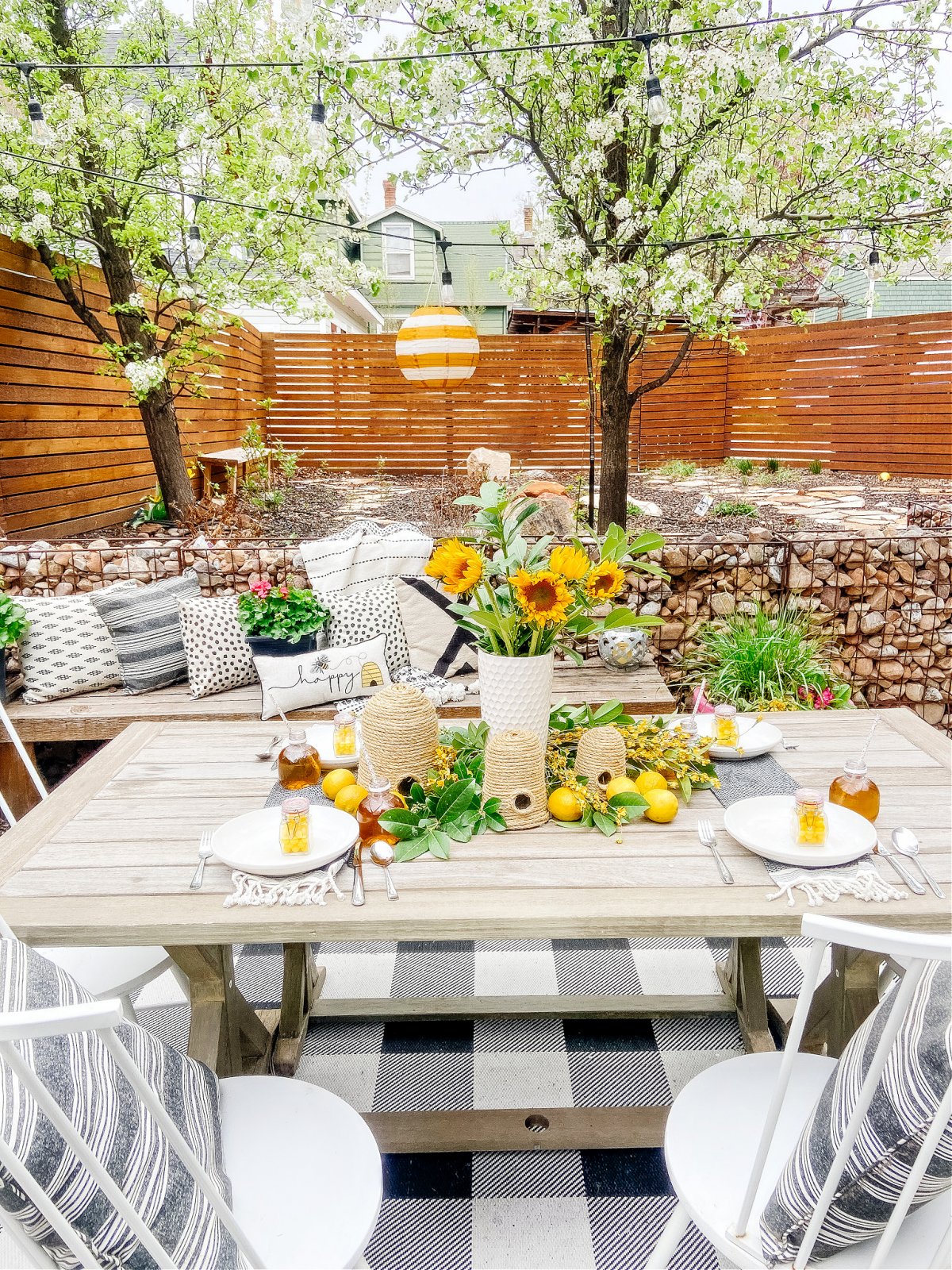 https://tatertotsandjello.com/wp-content/uploads/2021/04/beehive-table-and-patio-.jpg