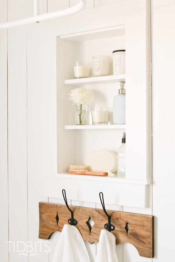 15 Between the Studs Bathroom Storage Ideas! Carve out space between the wall studs to increase storage space in a small bathroom. 