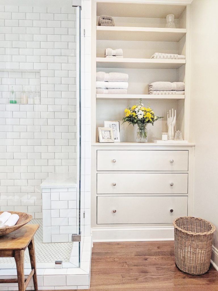 Built-ins Boost Storage in Small Bathrooms