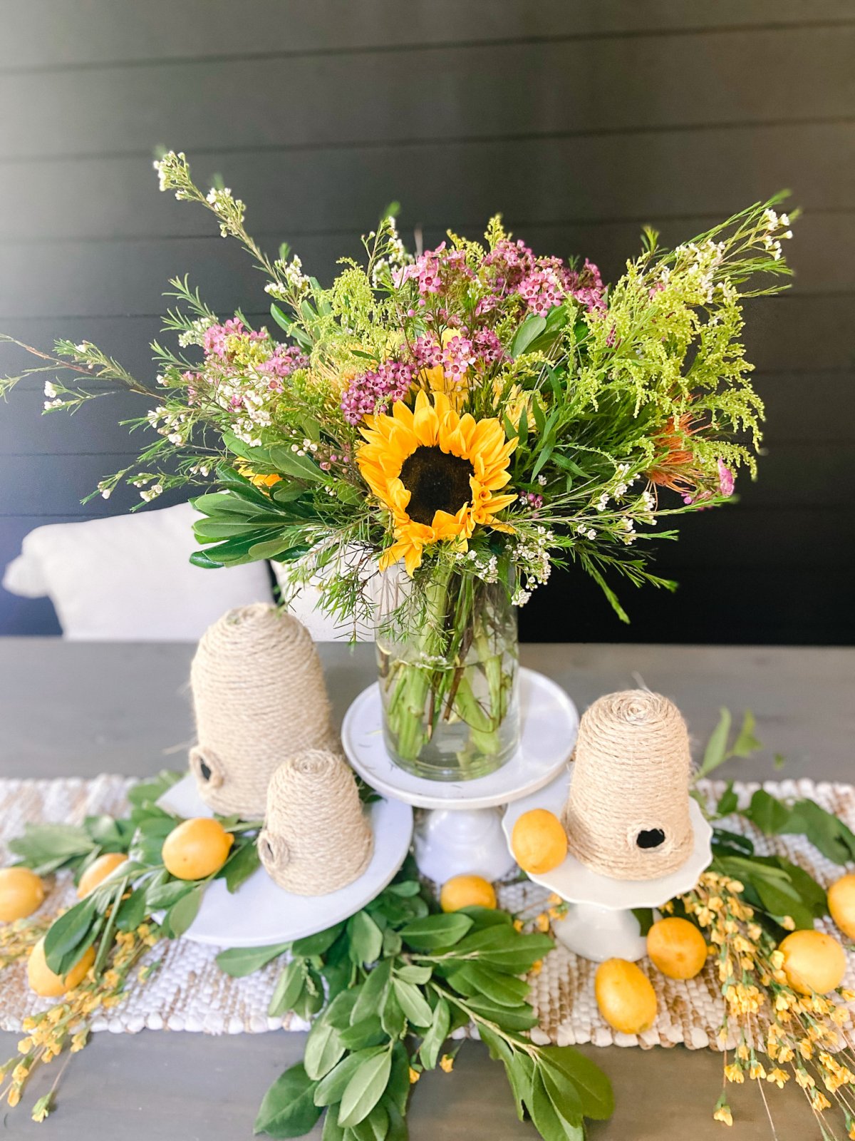 How to Arrange Summer Grocery Store Flowers. Grab an inexpensive bouquet at the store and transform it into a show stopping centerpiece. 