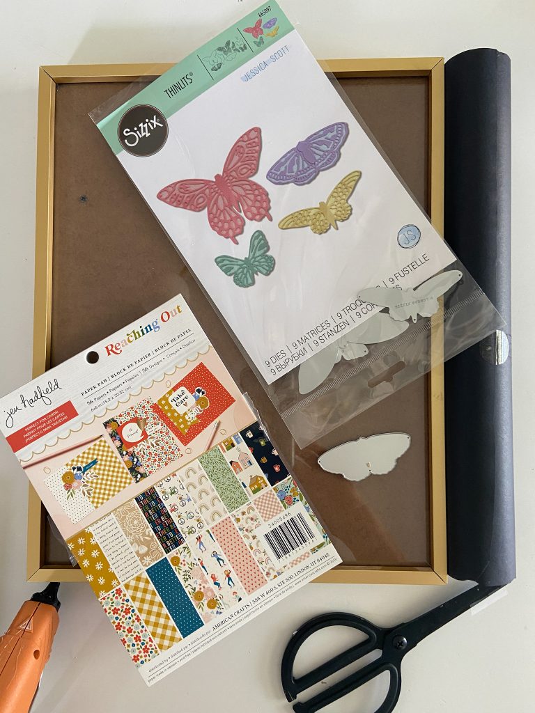 Butterfly Paper Specimen Art and Mantel. Use scrapbook paper and a butterfly die cut to create a three-dimensional and whimsical specimen art for a summer mantel! 