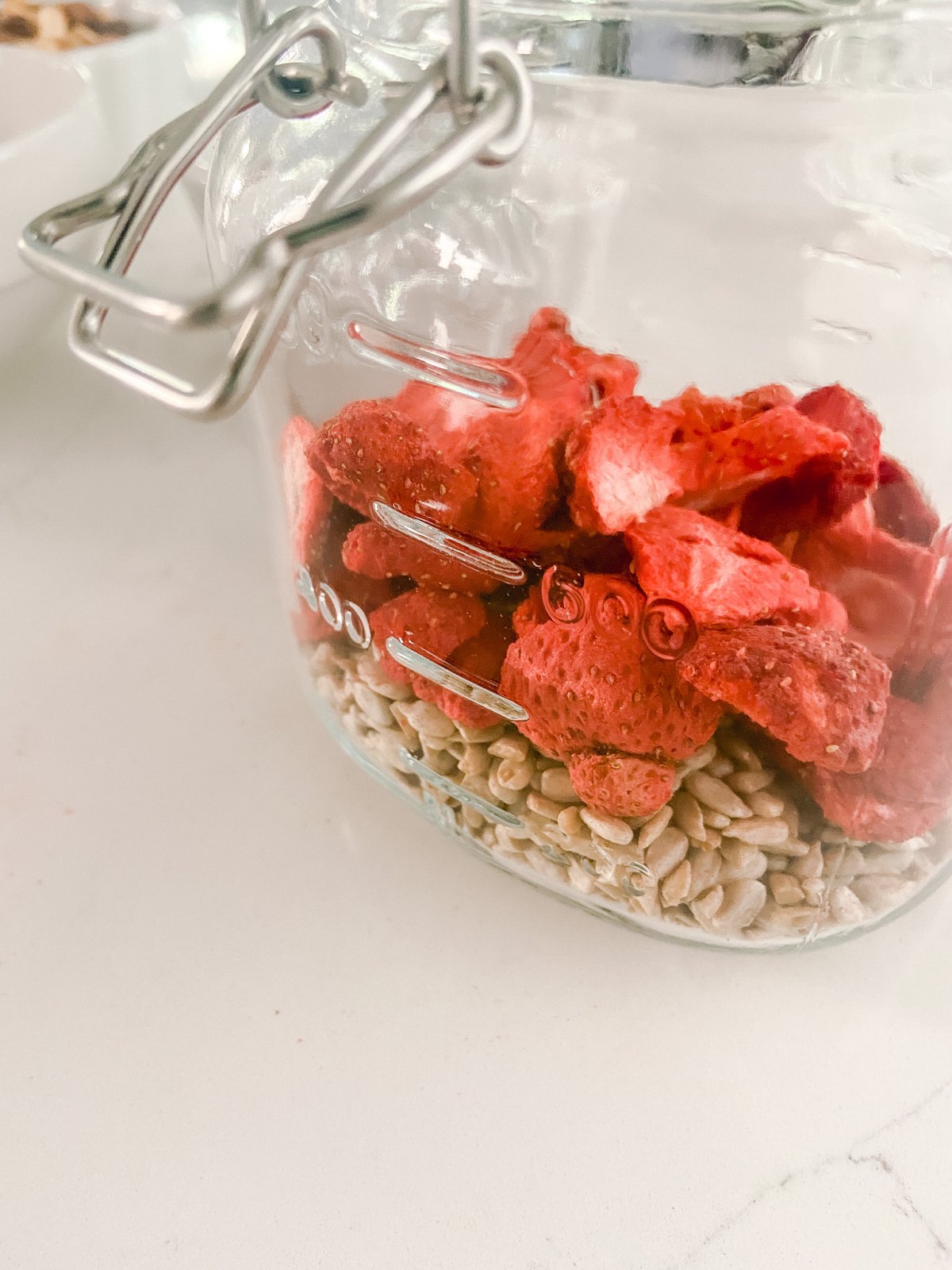 Low-Carb Keto Strawberry Chocolate Trail Mix with 5 grams net carbs per 1/3 cup serving. 