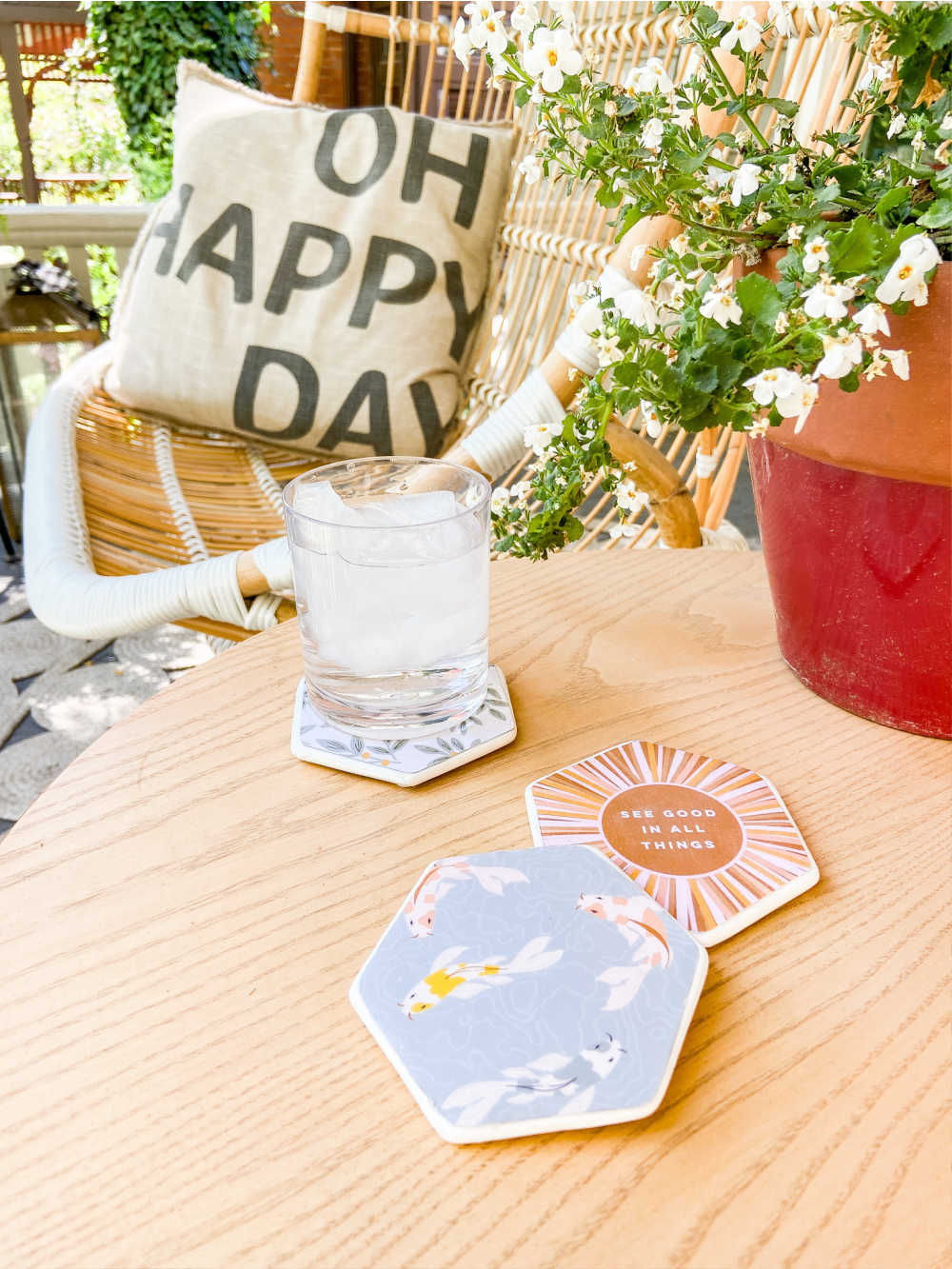 Summer Decoupage Concrete Coasters. Personalize concrete coasters with pretty paper for a DIY that's super easy and so fun to make with kids! 