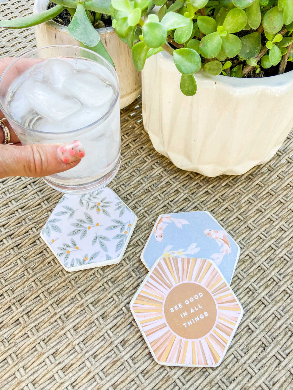 Summer Decoupage Concrete Coasters. Personalize concrete coasters with pretty paper for a DIY that's super easy and so fun to make with kids! 