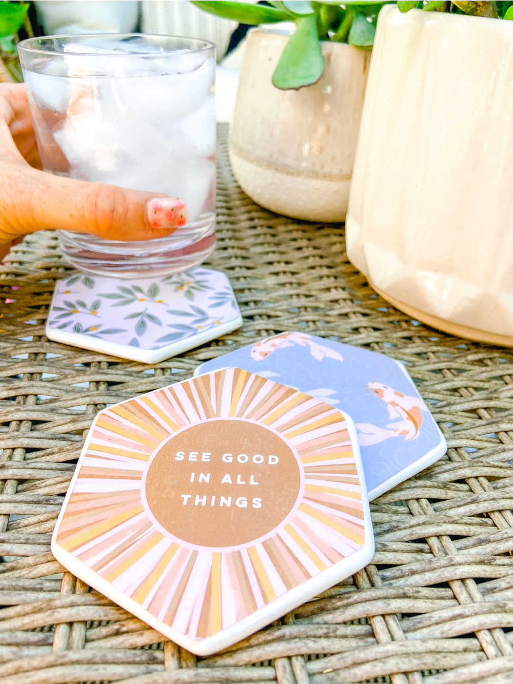 Summer Decoupage Concrete Coasters. Personalize concrete coasters with pretty paper for a DIY that's super easy and so fun to make with kids! 