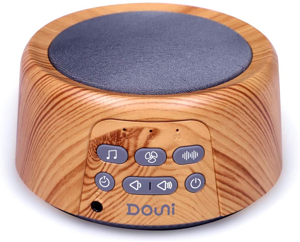 Wood grain white noise machine with 24 sounds. 