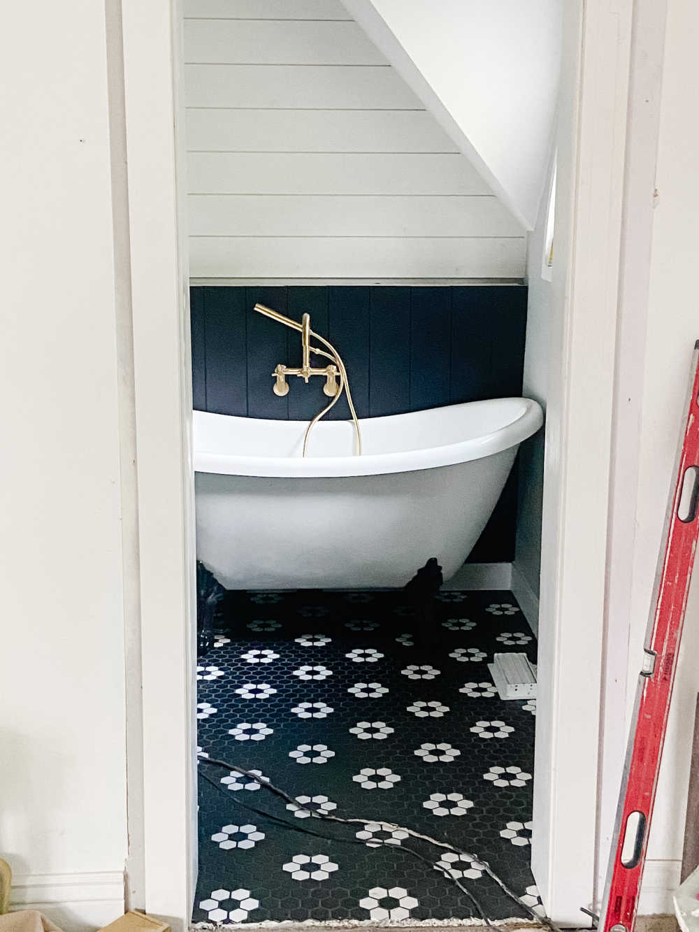 Black and white modern vintage bathroom remodel. 