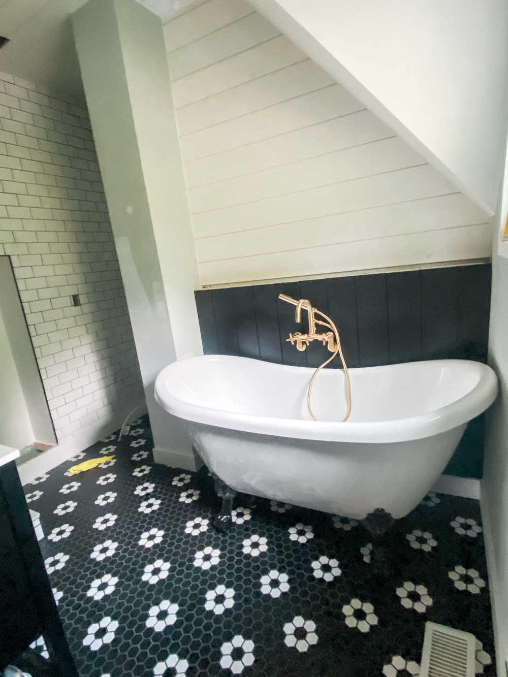 Black and white modern vintage bathroom remodel. 