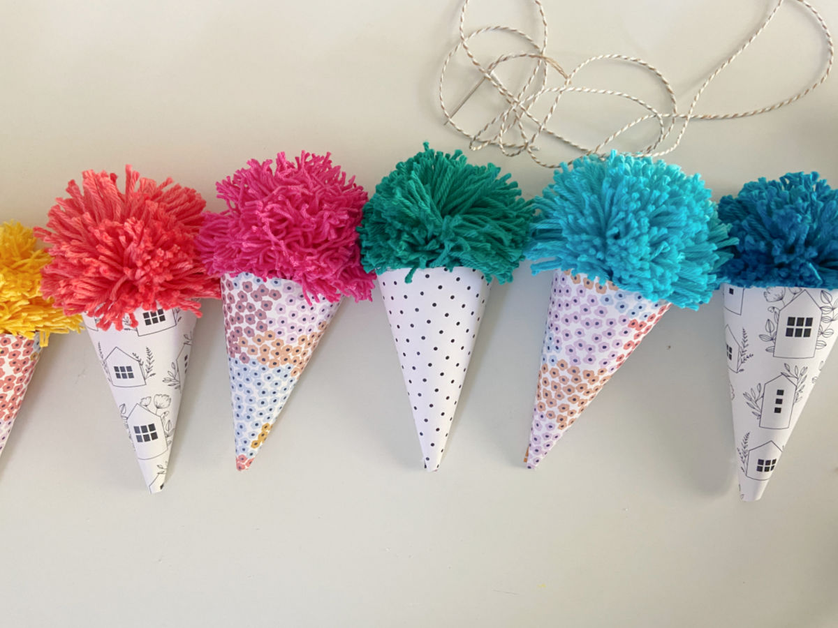 Ice Cream Cone Garland and Free Summer Printable. Celebrate Summer by creating an DIY Ice Cream Cone Banner with a matching printable for instant summer decor! 