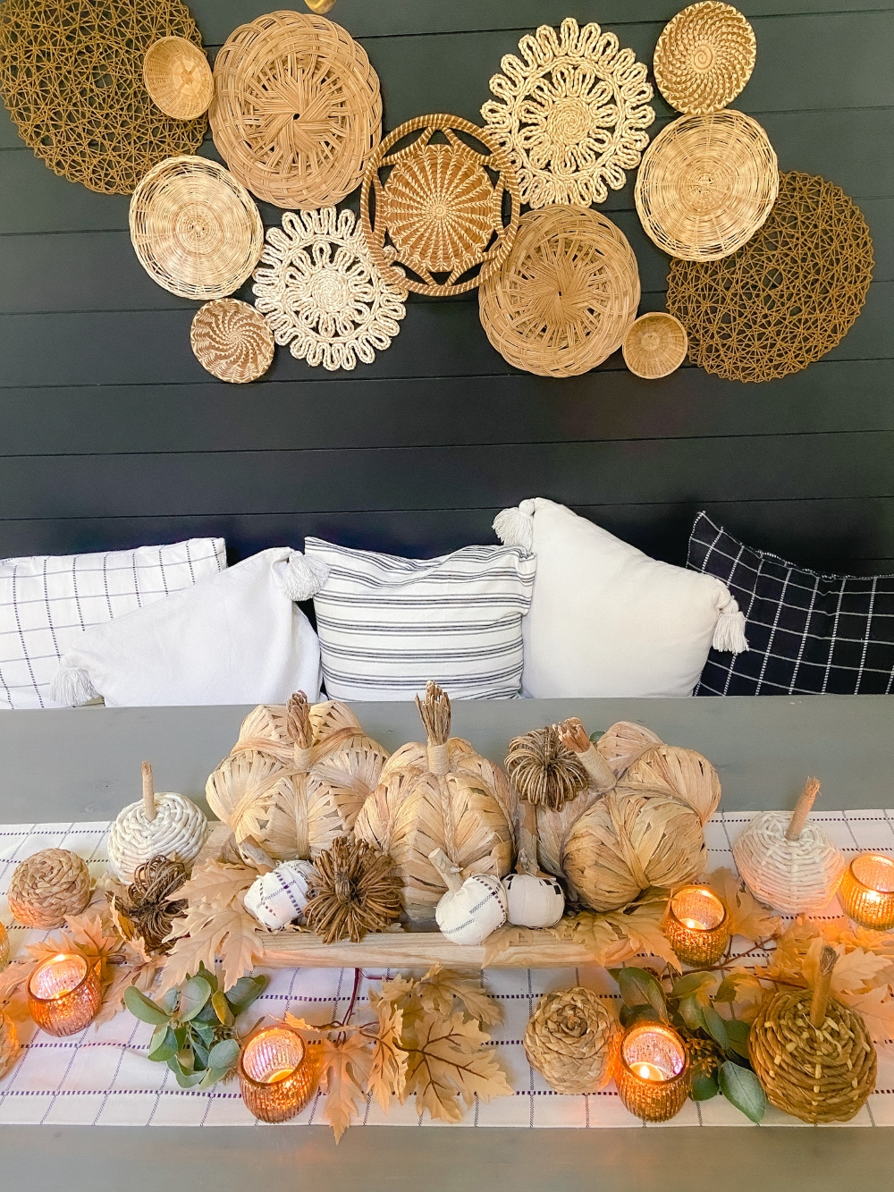Boho Cottage Fall Tablescape. Create a warm and inviting table by making a DIY table runner, pillows and a beautiful footed bowl centerpiece filled with textured, fabric-covered pumpkins and leaves.