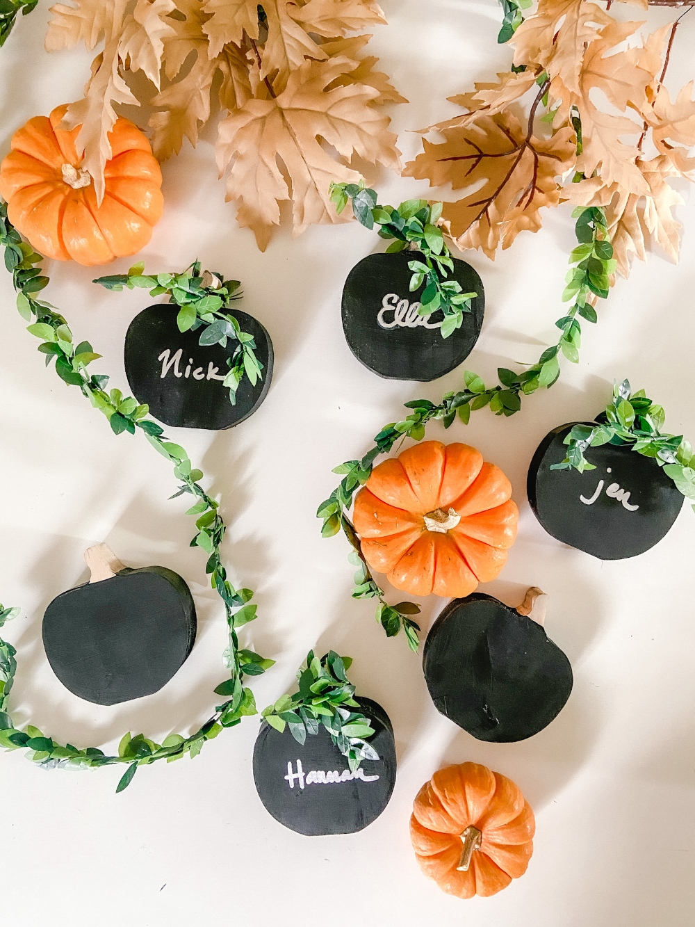 DIY Wood Chalkboard Pumpkin Place Markers. Get ready for fall entertaining by making these easy pumpkin-shaped wood chalkboard place markers! It’s a 10-minute project that can be used all autumn long!