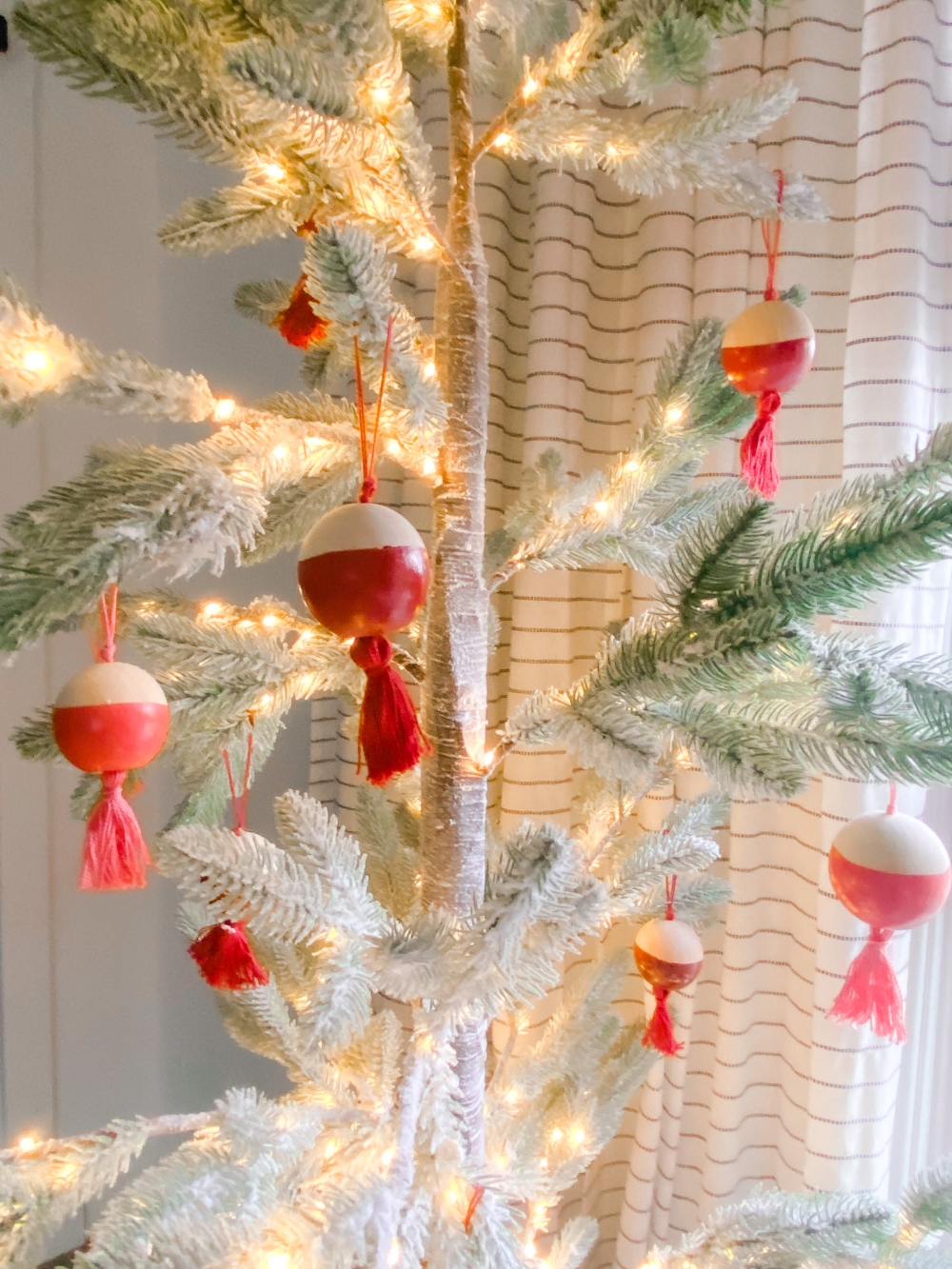 DIY Boho Wood and Tassel Ornaments. Add a little boho vibe to your holiday tree with this fun DIY painted bead ball ornament.  