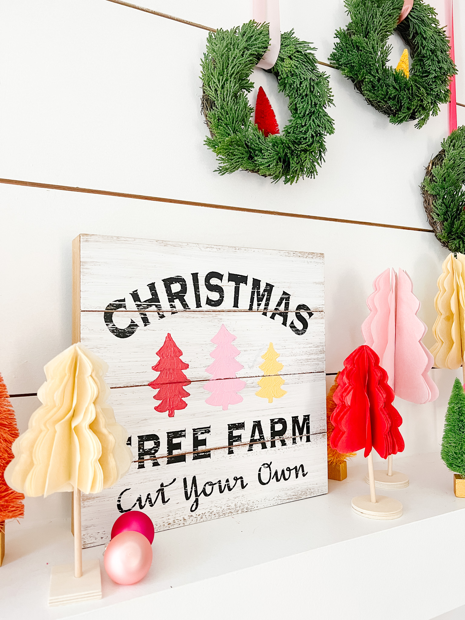 DIY Tissue Paper Holiday Trees. Add some color to your mantel or shelf by making these easy tissue paper trees with free printable templates.