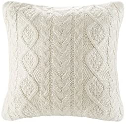 How to make your bedroom cozy for the holidays - sweater pillows.