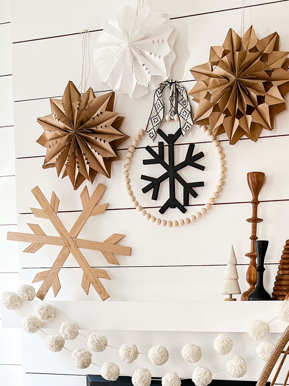 Snowflake Winter Wreath - Three Ways! I took my favorite wood DIY snowflake and showed how to use it to create THREE easy winter wreaths!