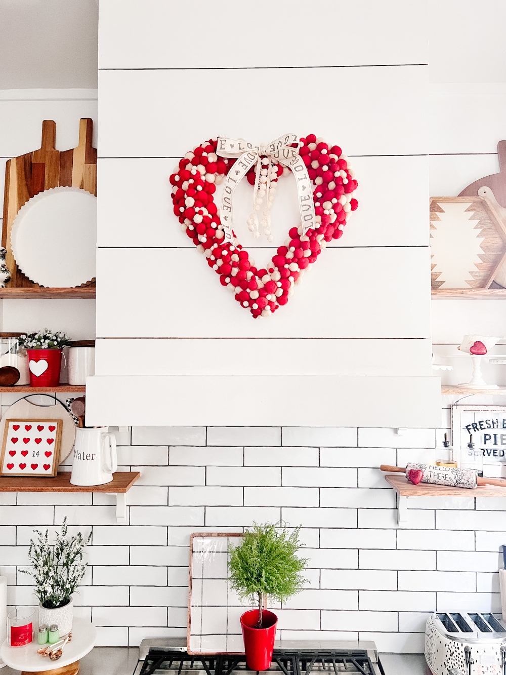 Christmas Garland to Valentine Wreath! Upcycle a Christmas garland and turn it into a fun and festive Valentine decoration! 