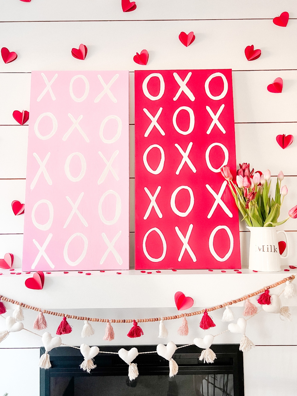 Valentine XOXO Mantel Ideas. Upcycle and paint some easy XOXO signs, add paper hearts and you have an adorable mantel or shelf vignette! 