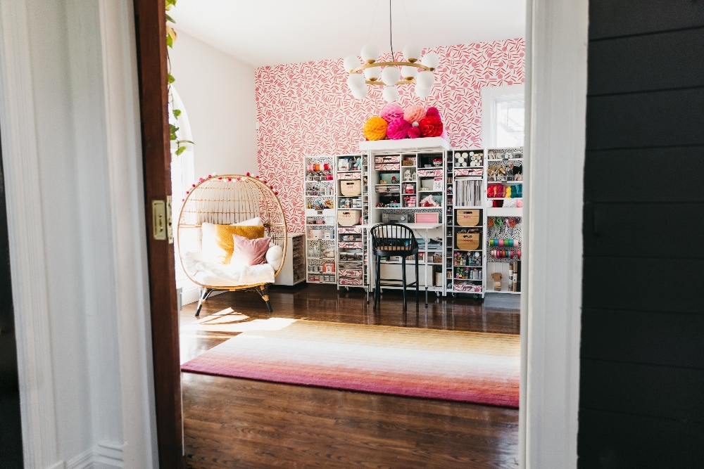 Bright Organized Craft Room Office. Bright peel-and-stick wallpaper, an organized desk and Dream Box with storage galore make working so much more fun and efficient! 