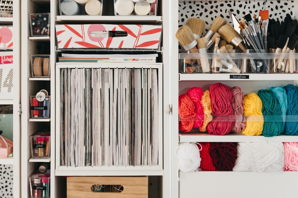 Bright Organized Craft Room Office. Bright peel-and-stick wallpaper, an organized desk and Dream Box with storage galore make working so much more fun and efficient! 