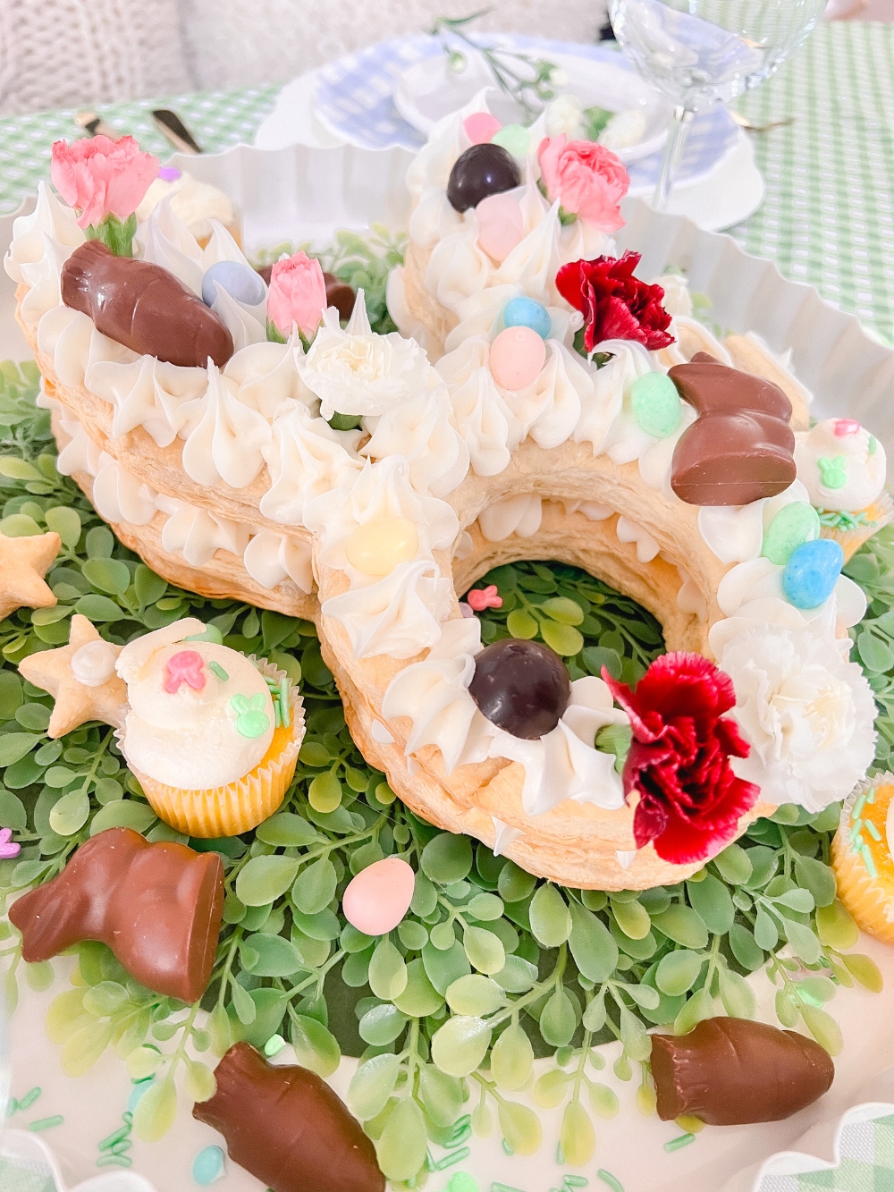 Bunny Puff Pastry Easter Tart. Layers of flaky crust and sweet cream cheese frosting make beautiful dessert  that also makes an edible centerpiece for your holiday table!